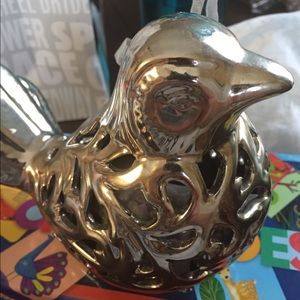 silver color bird decor
